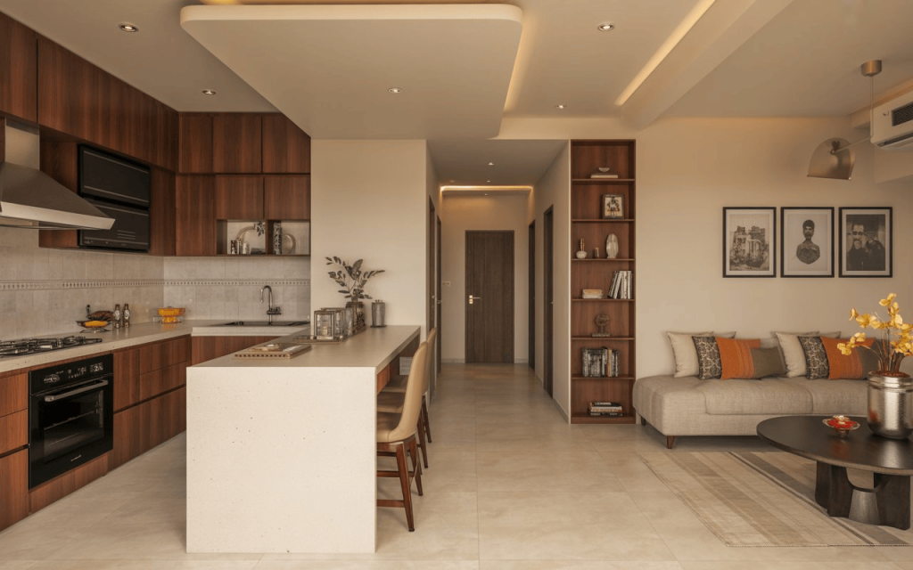 Elegant open kitchen slab design with island counter and modern wood cabinets in spacious living area