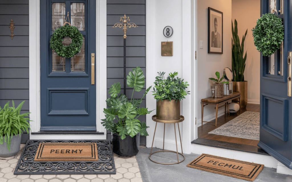 Fresh front door entrance decor ideas with greenery wreath stylish planters and inviting home entry