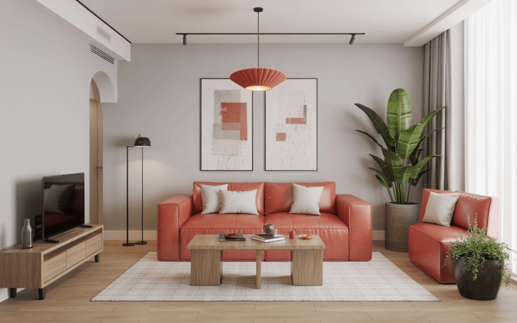 Vibrant indian small flat interior low budget setup with a terracotta sofa and wooden table.