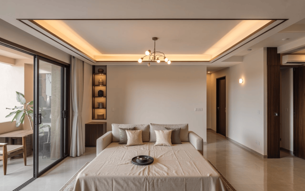 Elegant false ceiling design for room with cove lighting and modern chandelier in stylish bedroom
