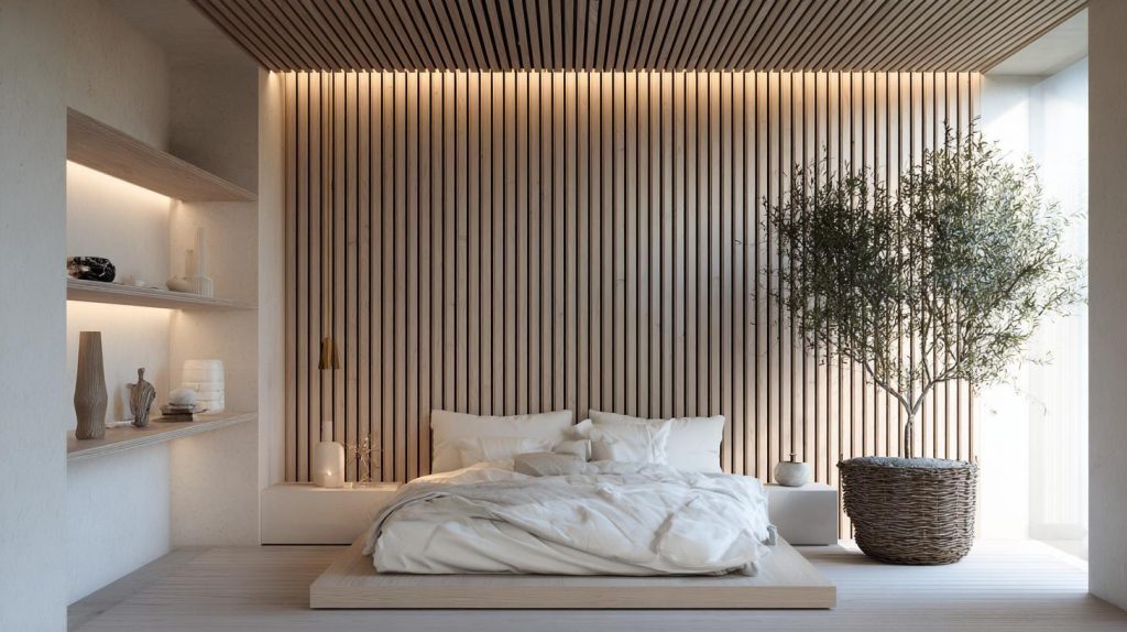 Minimalist Japandi bedroom featuring a light wood pvc panel wall design behind a low bed.