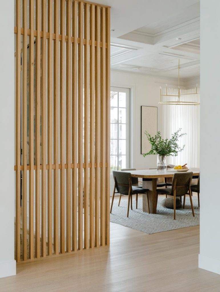 Fluted panel partition dining room wood design