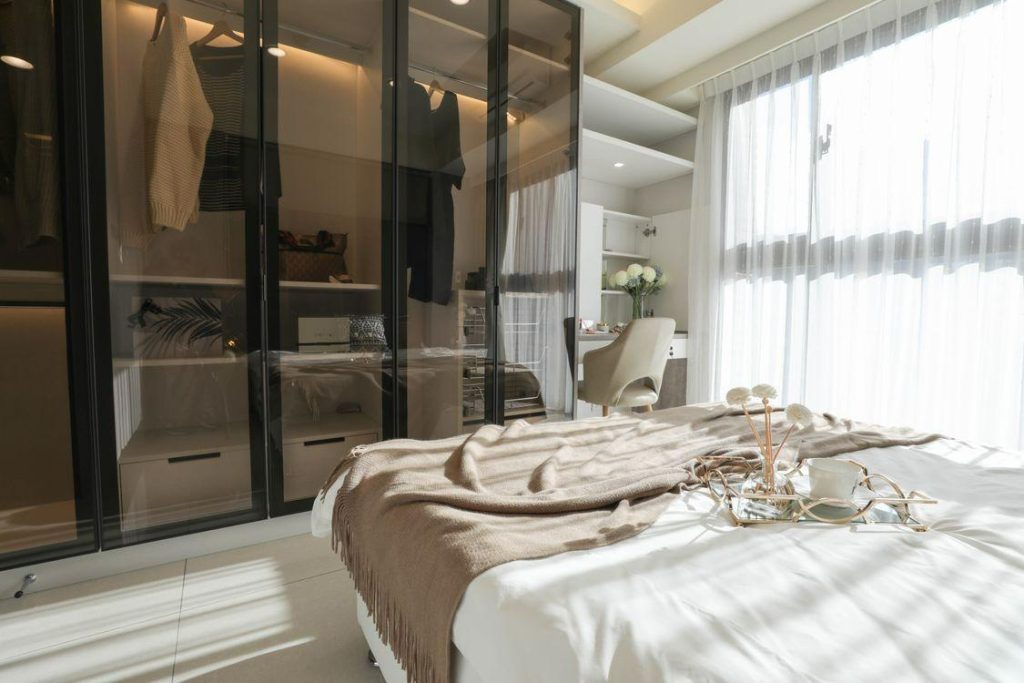 Mirrored glass swing wardrobe design, bedroom storage