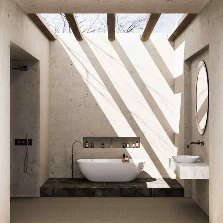 Minimalist outdoor bathroom concrete tub round mirror