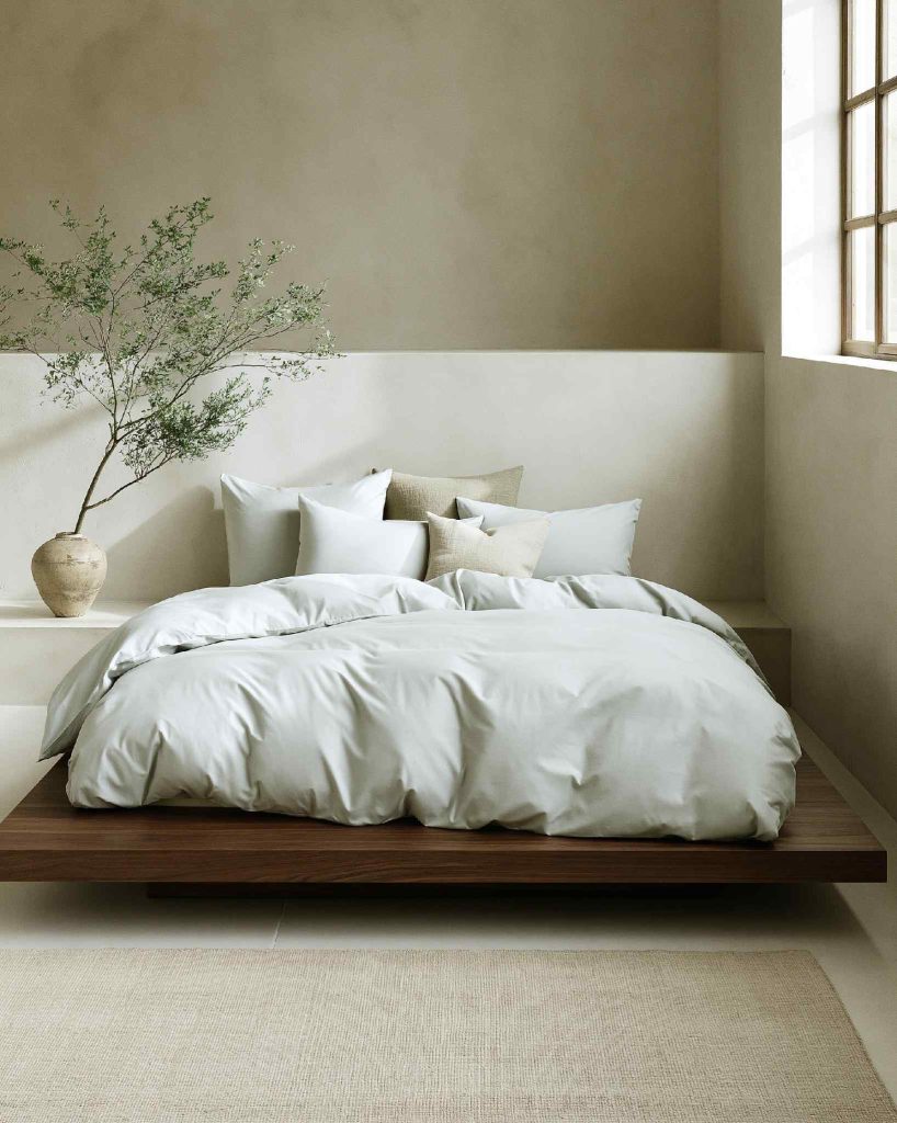 Floating pallet bed in neutral bedroom