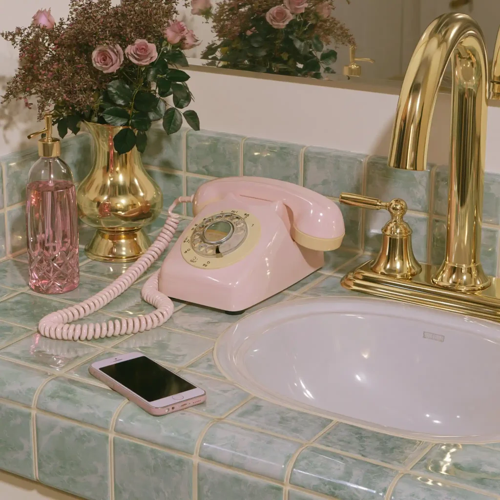Rose gold bathroom idea with vintage faucet decor