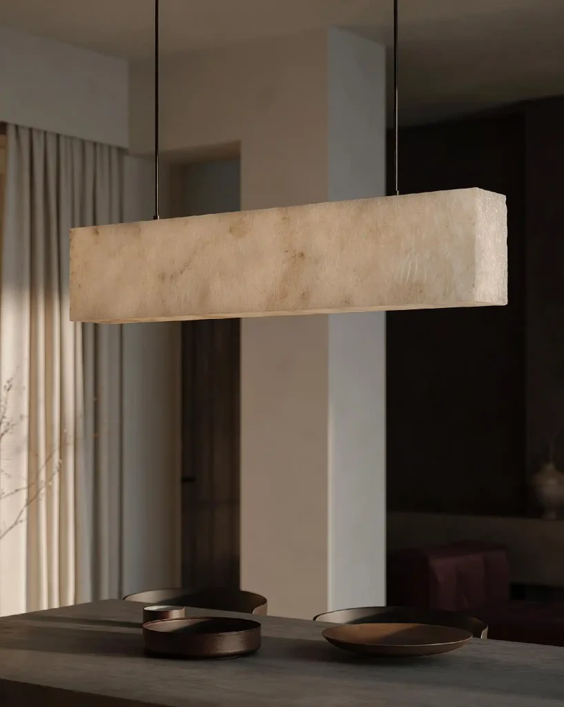  A linear fabric-shade chandelier suits spacious master bedroom lighting needs.