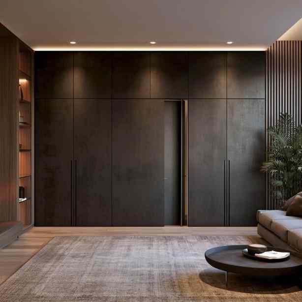 Hidden sliding door design in dark panelled wall