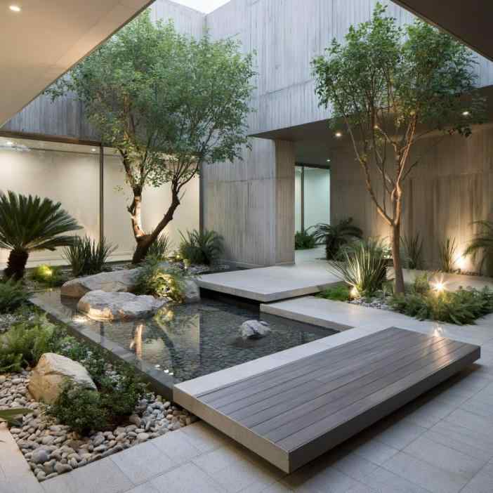  Indoor landscape courtyard with pond and trees