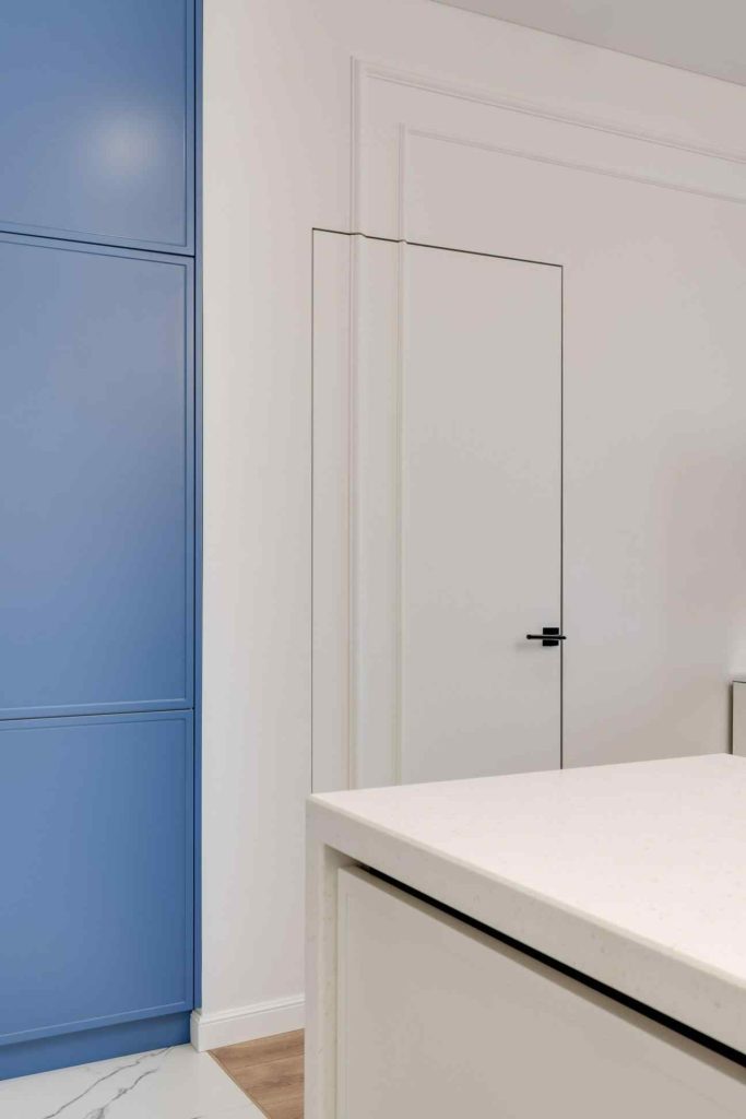  Flush hidden door design in fluted panel wall