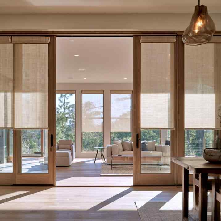 Sliding door curtain design with woven shades
